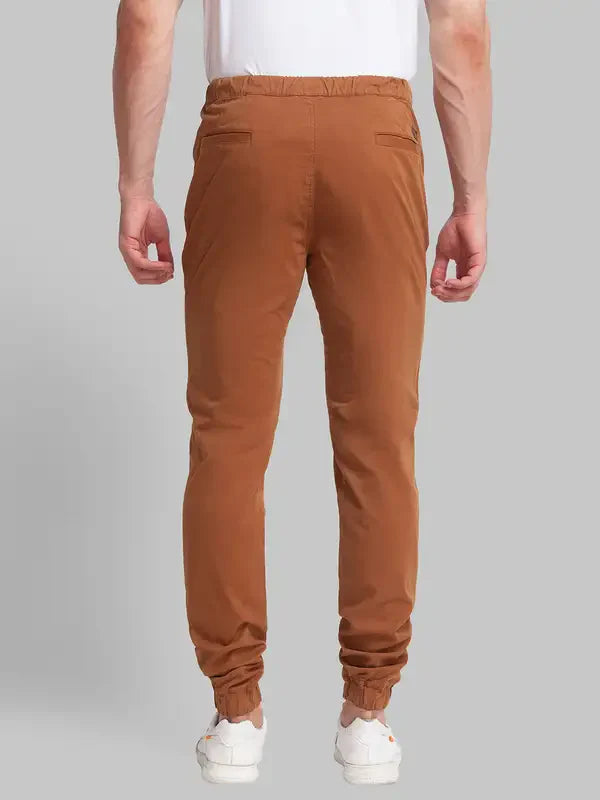 Men Brown Lrt Fit Solid Cotton Blend Trouser