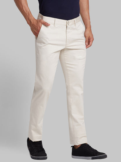 Parx Beige Solid Low Rise Tapered Fit Cotton Blend Trouser